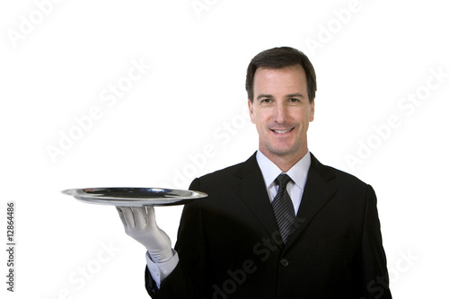 Businessman carrying silver platter