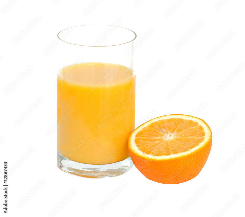 Glass of natural orange juice and section of orange Glass of natural orange juice and section of orange