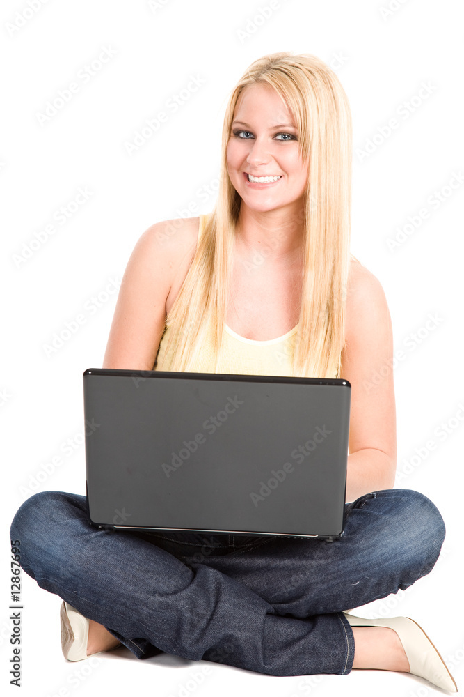 Naklejka premium Young student with laptop