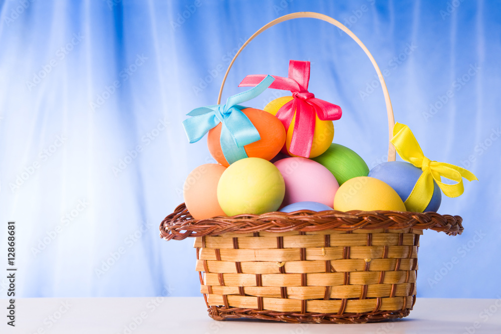 Basket with colorful eggs