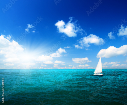 sailboat sky and ocean