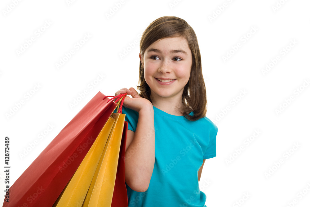Girl holding shopping bags isolated on white background Girl holding shopping bags isolated on white background