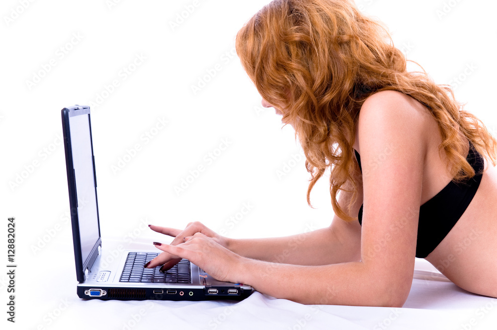 Young pretty girl using laptop computer. Young pretty girl using laptop computer.