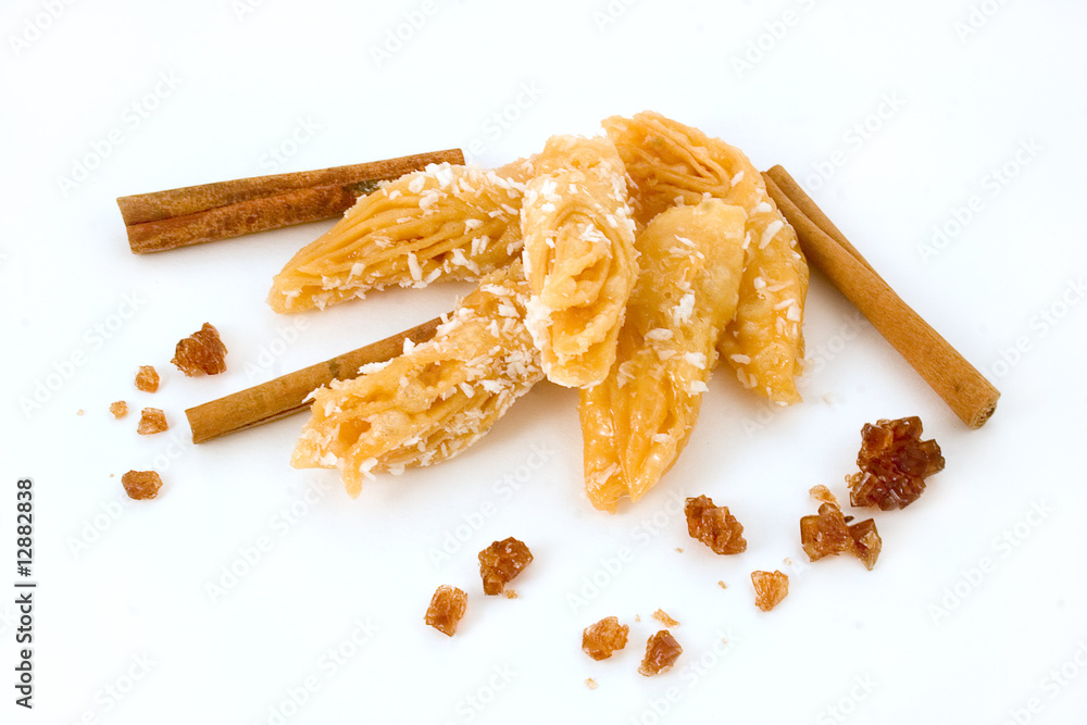 Sweets with coconut, cinnamon and brown sugar Sweets with coconut, cinnamon and brown sugar
