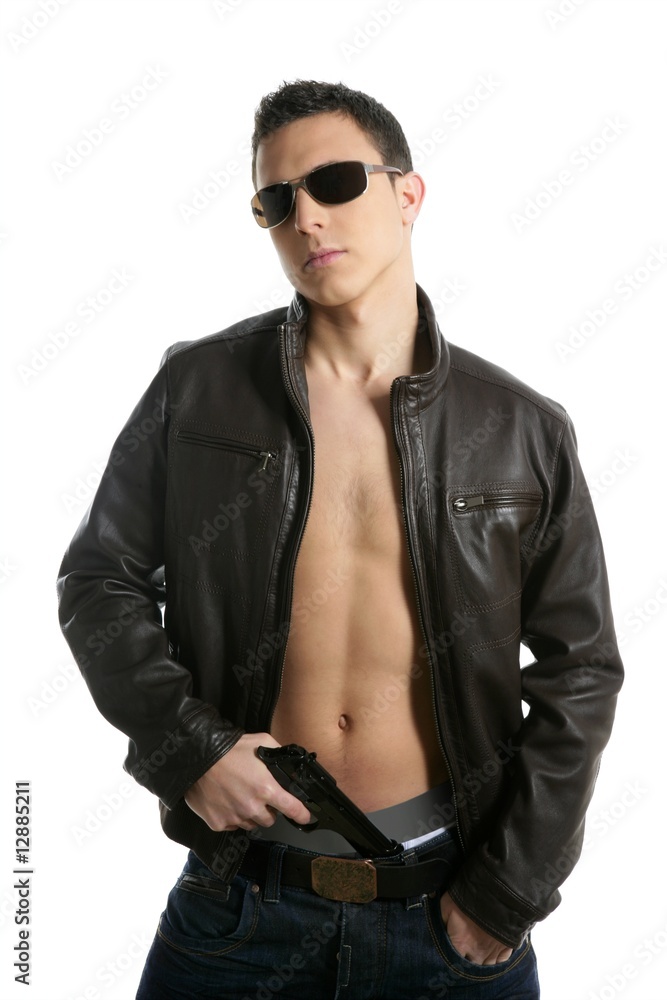 Fototapeta premium Young sexy boy sunglasses leather and gun