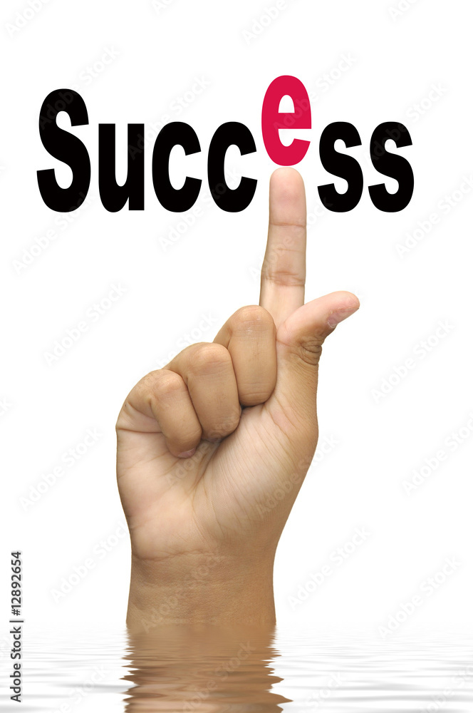 Hand with success word isolated in white Hand with success word isolated in white