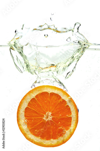 Orange dropped in water