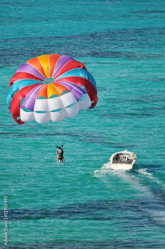 parasailing over the Caribbean ocean