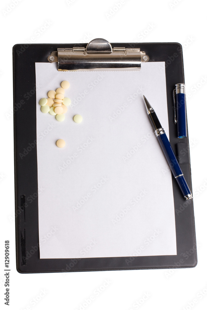 Pills and notepad Pills and notepad