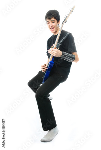 young man playing the guitar