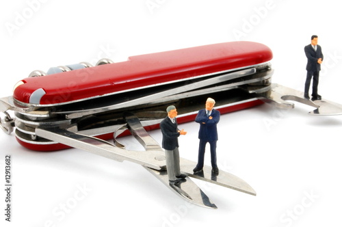 Fotografi business people on penknife
