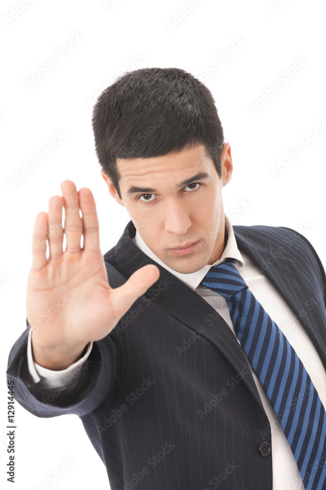 Unfriendly serious businessman or security man gesturing Unfriendly serious businessman or security man gesturing