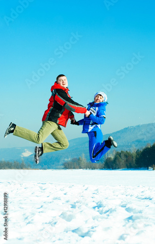 happy jumping couple