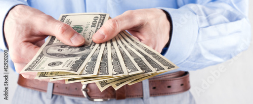 Money in the hands of the businessman