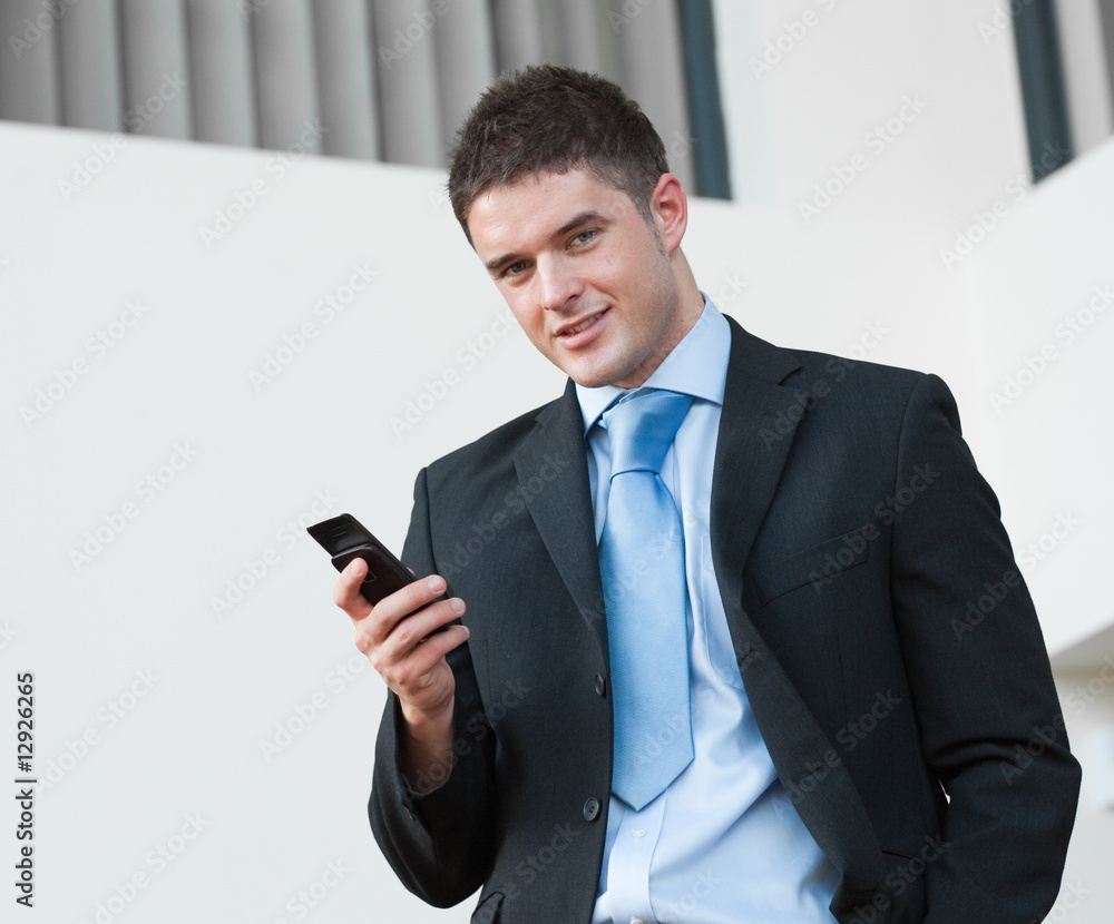 Business man with a mobile Business man with a mobile