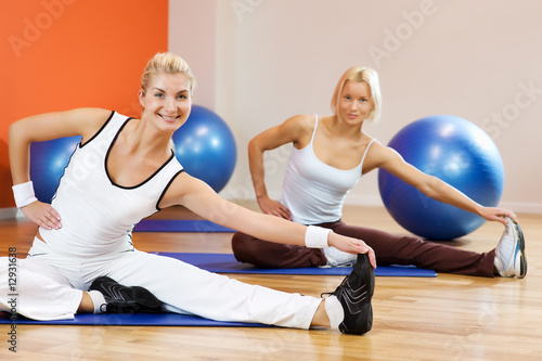 Group of people doing stretching exercise