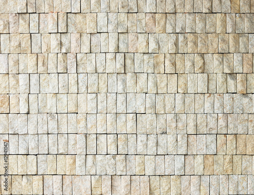 Fragment of rough gravel brick wall