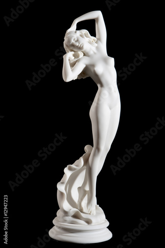 Classical white Aphrodite statue isolated on black
