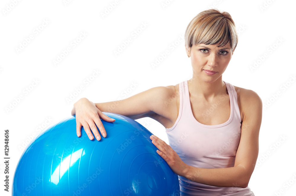 Sportswoman exercising on a Fitness Ball Sportswoman exercising on a Fitness Ball