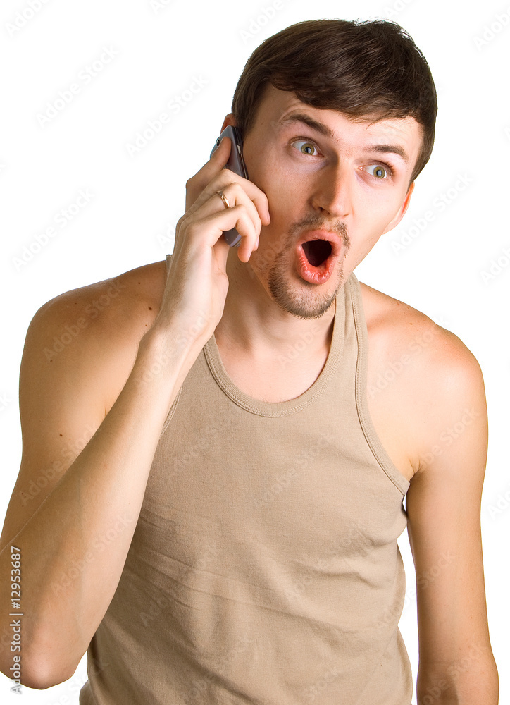 young surprised men with cellular phone young surprised men with cellular phone