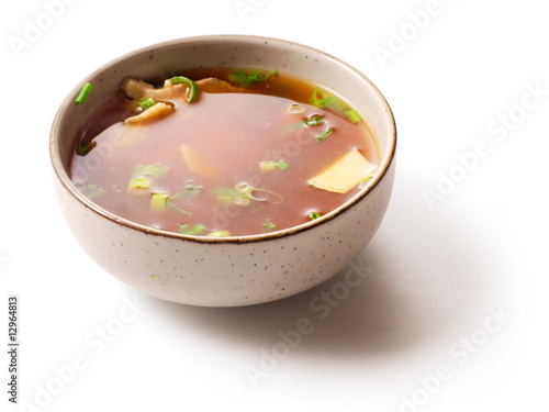 Miso soup with green onion in small dish