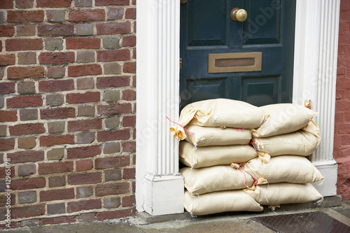 Sandbags Stacked In A Doorway In Preparation For Flooding