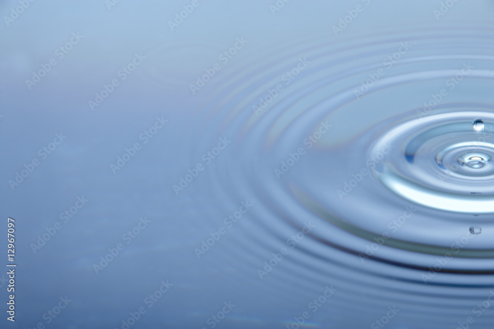 Concentric Circles Forming In Still Water Concentric Circles Forming In Still Water
