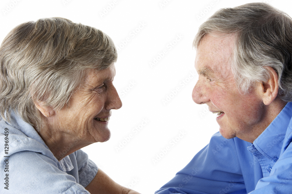 Portrait of senior couple smiling at each other Portrait of senior couple smiling at each other