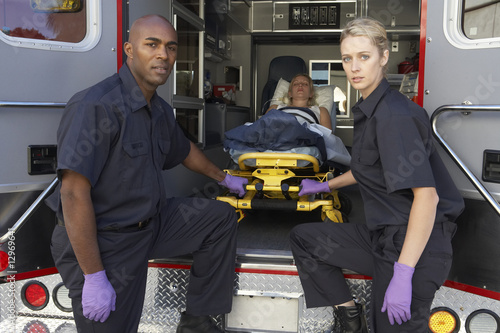 Paramedics preparing to unload patient from ambulance