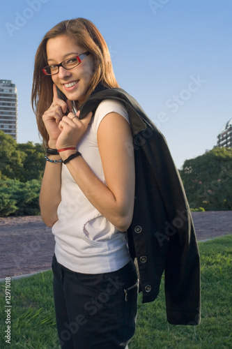Cute Lawyer Talking on the Phone in Sunny Outdoor