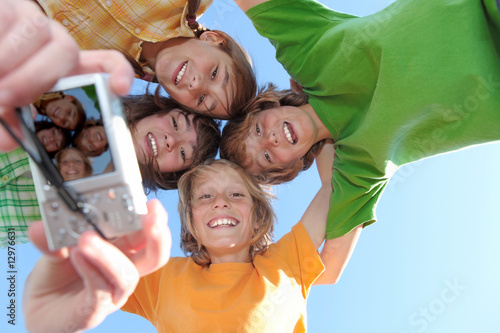 group of kids or chidren with happy smiling faces photo