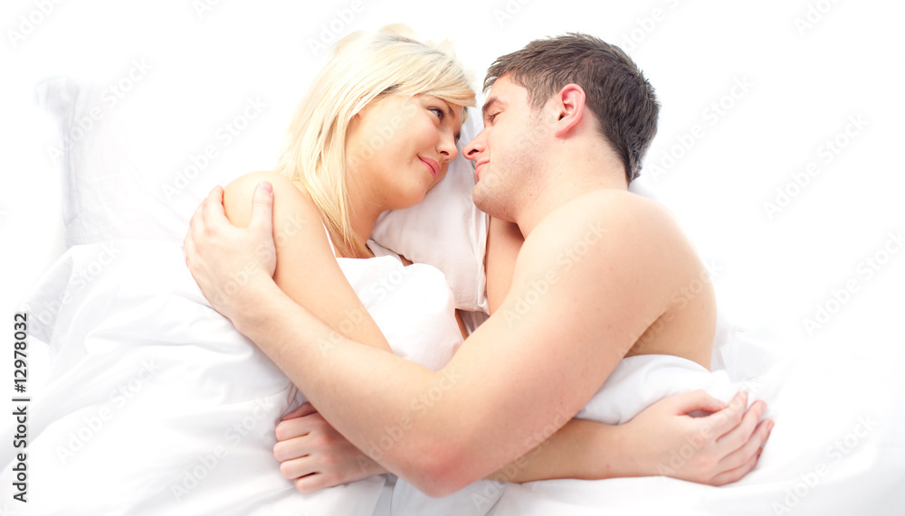 loving Couple relaxing on bed