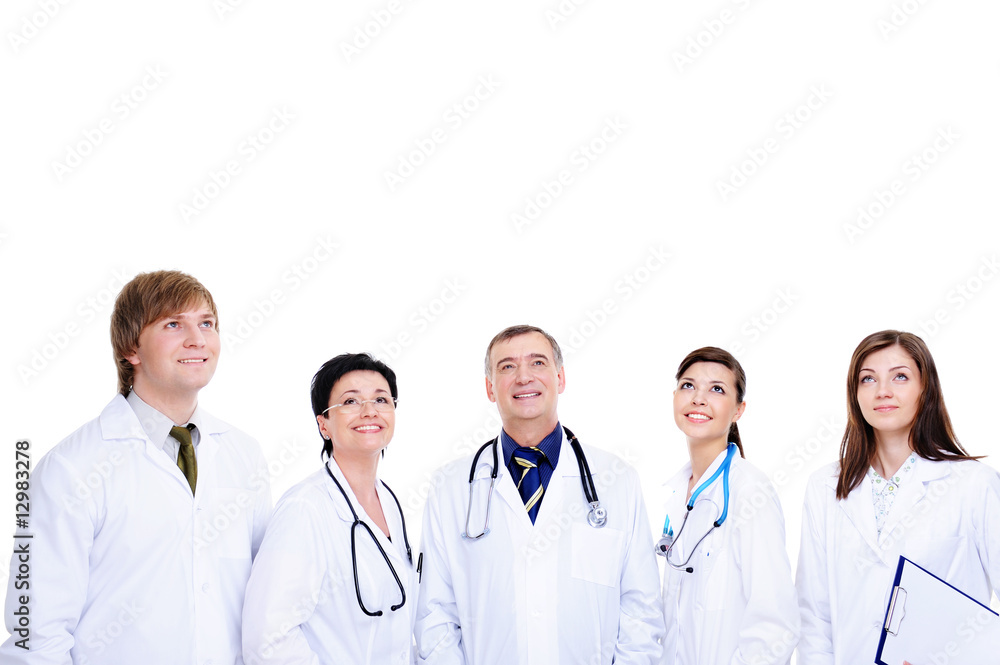 Fototapeta premium five laughing successful doctors looking u