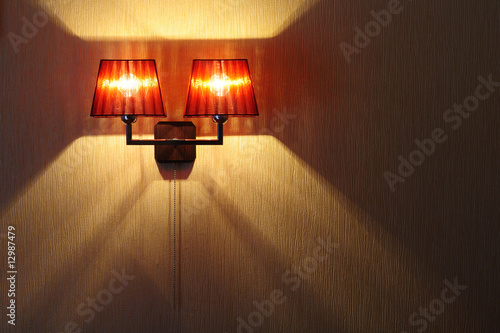 red lamp on wall.