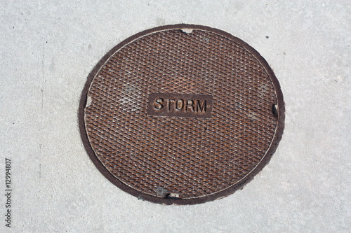 a close up of a manhole cover