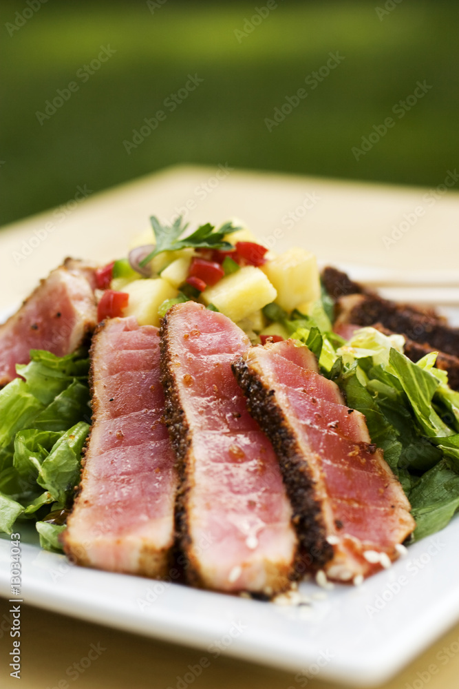 Seared tuna on square plate