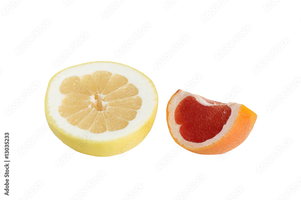 Pieces of grapefruit on a white. Pieces of grapefruit on a white.
