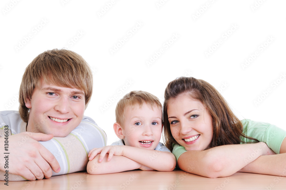 laughing happy family with their little son laughing happy family with their little son