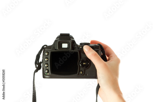 camera in woman hands isolated on white