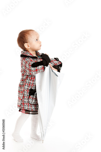 Baby with umbrella photo