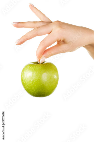 Woman's hand holding an apple