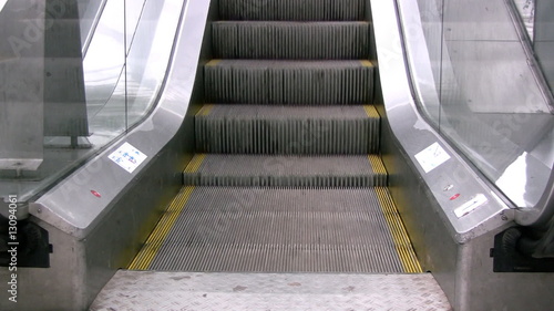 A close view of an escalator moving upwards