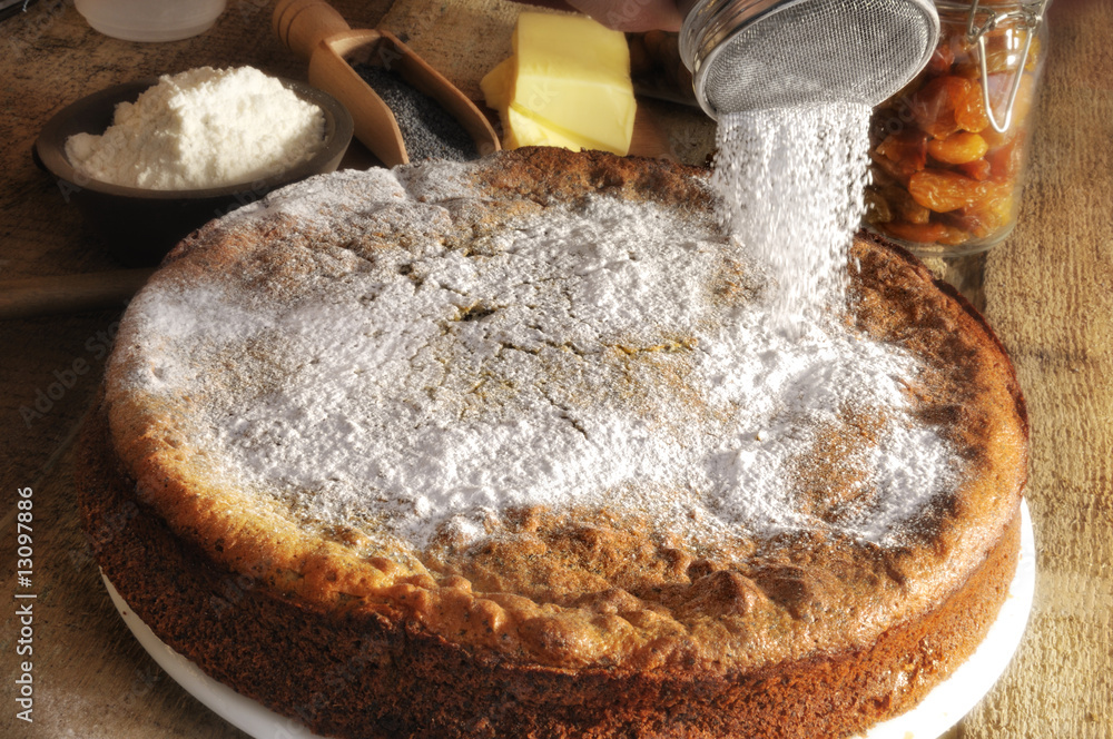 Mohntorte mit Puderzucker bestreuen Stock-Foto | Adobe Stock Mohntorte mit Puderzucker bestreuen Stock-Foto | Adobe Stock