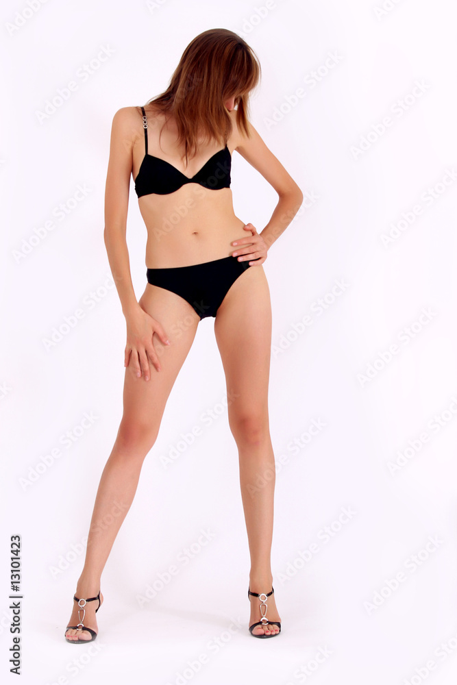 woman in black bikini posing