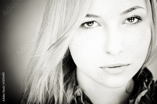 portrait of young blond girl with beautiful eyes.