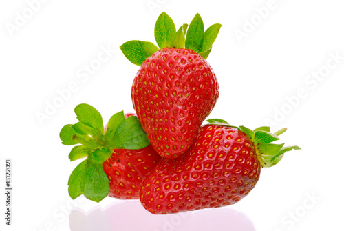 Fototapeta Naklejka Na Ścianę i Meble -  Three delicious strawberries