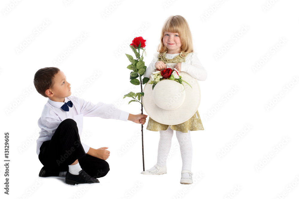 little boy with rose and girl isolated on white little boy with rose and girl isolated on white