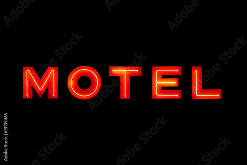 Motel neon sign isolated on black