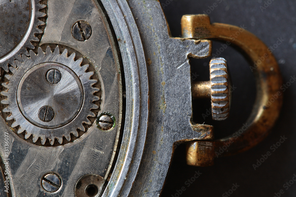 Close-up of old watch mechanism as background Close-up of old watch mechanism as background
