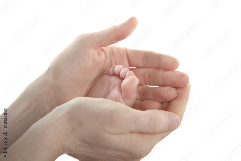 Mother and son, daughter holding feet Mother and son, daughter holding feet